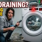Whirlpool washing machine not draining water with standing water visible inside the drum.